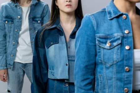 Vintage denim jacket laid flat showing classic trucker style design
