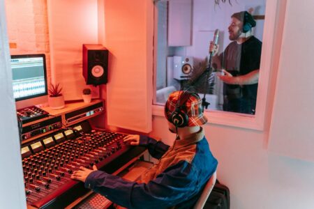 Professional recording studio setup with microphone and audio equipment for podcast production