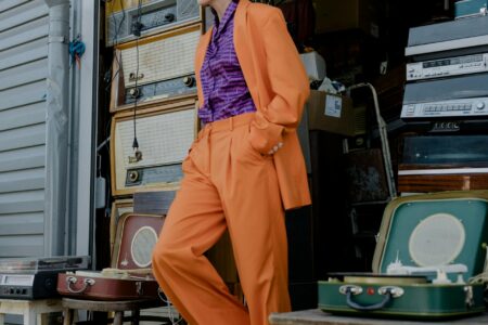 Vibrant colorful clothing and accessories displayed together showing the dopamine dressing trend