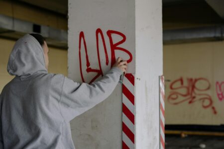 Colorful street art and graffiti covering an urban wall