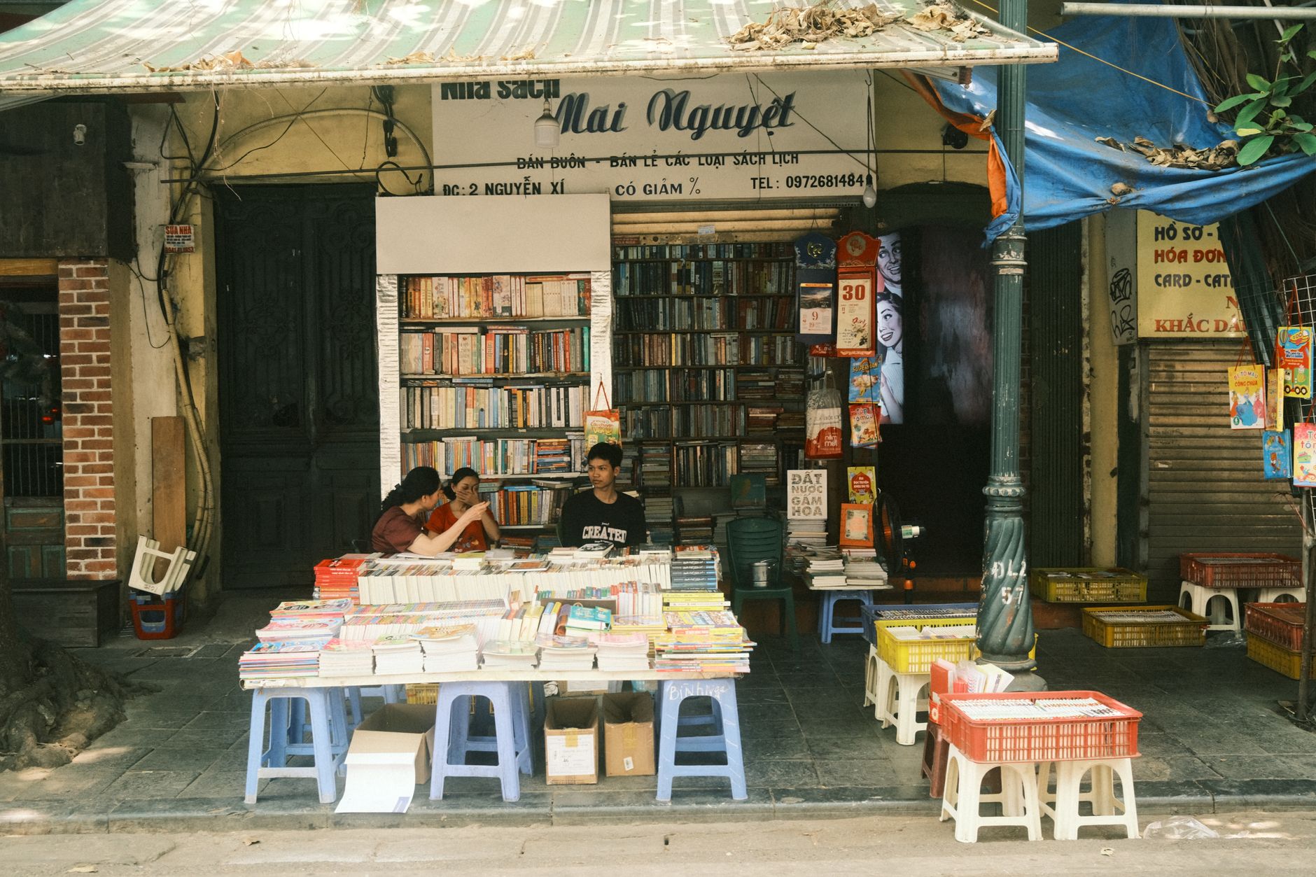 Shelves of books inside a warmly lit independent bookstore
