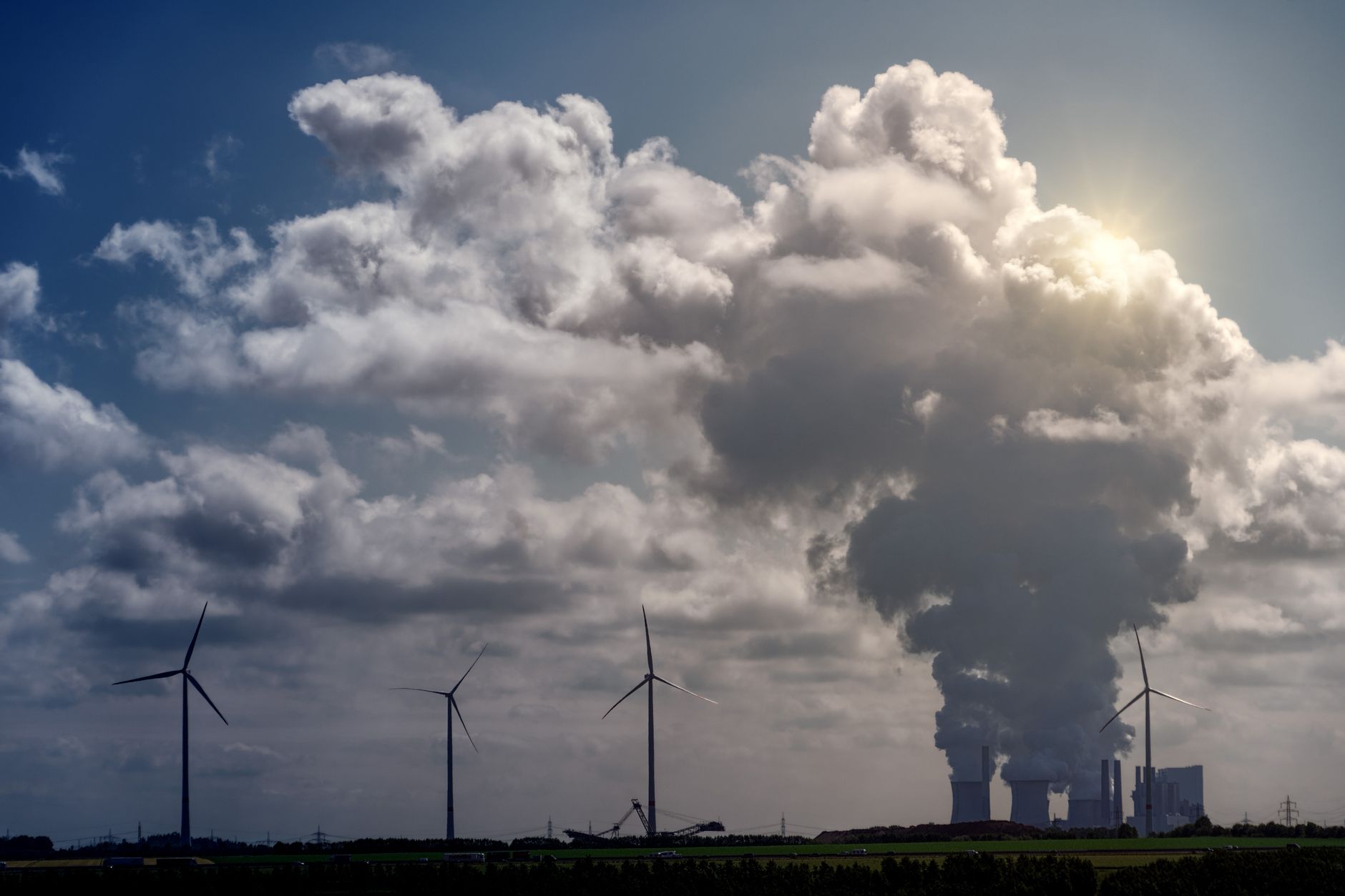 Large industrial gas turbines operating at a power generation facility