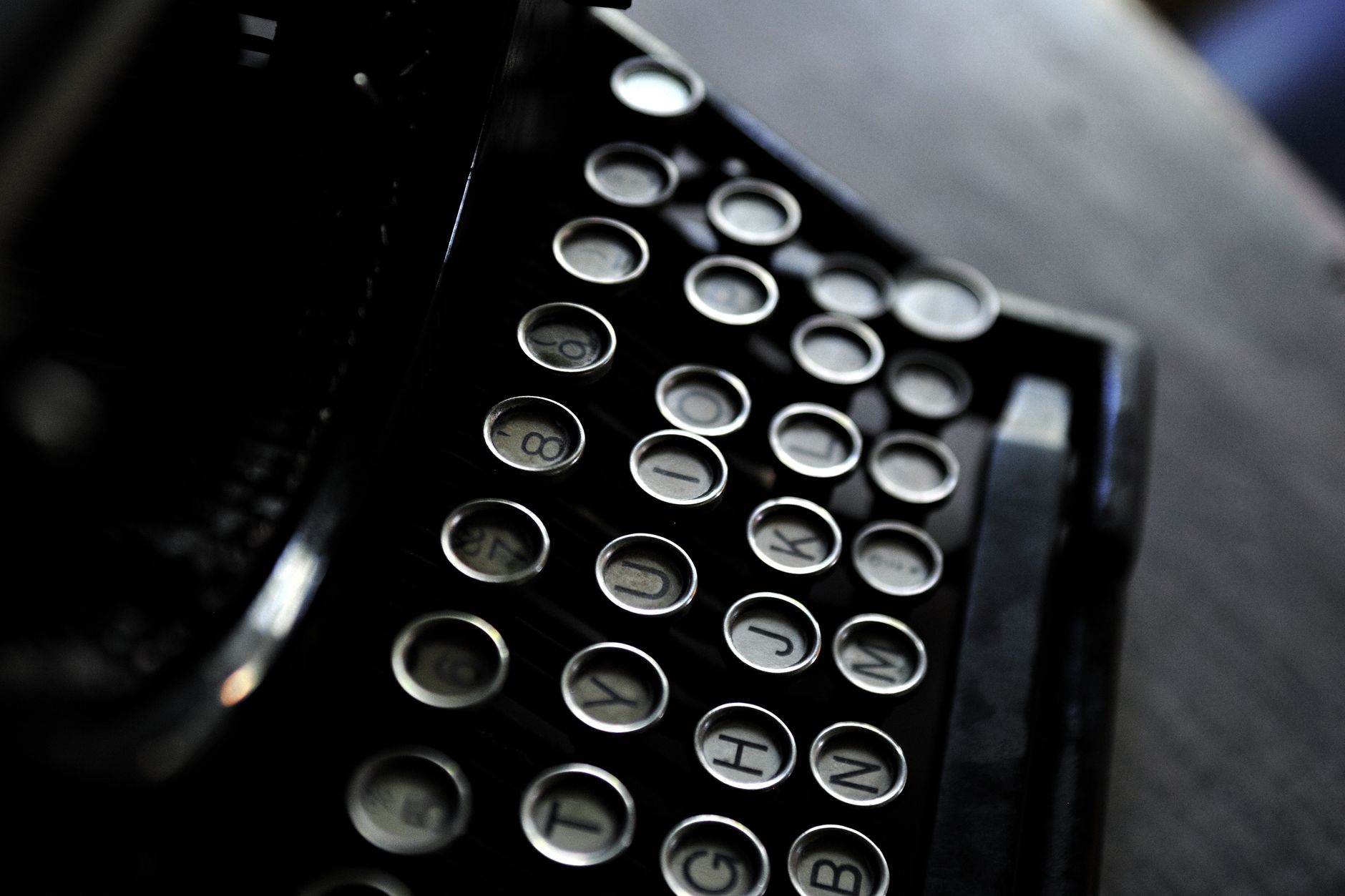 Close-up of an old typewriter with a sheet of paper, evoking literary history