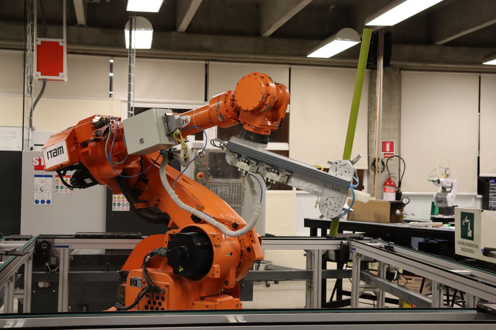 Industrial robotic arm mechanism with precision joints and actuators