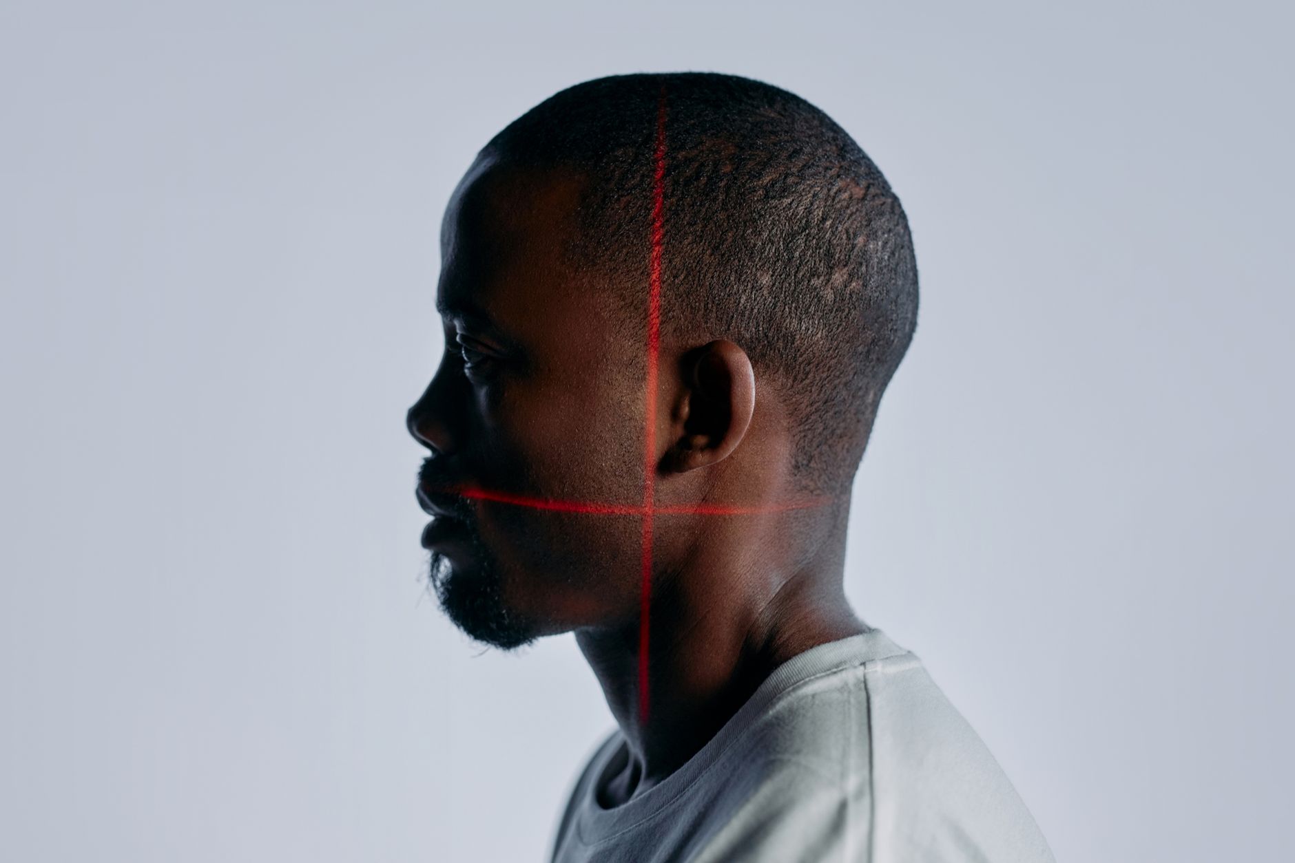 Close-up of a facial recognition interface scanning a human face with digital overlay markers