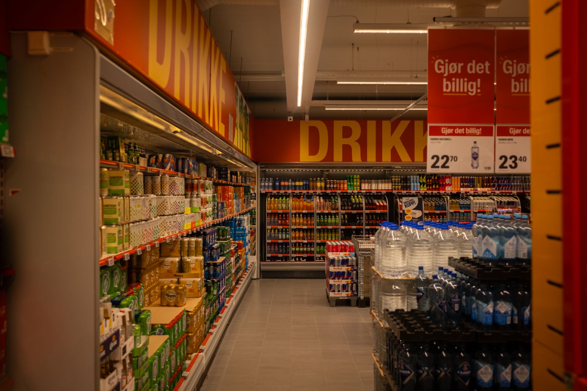 Retail shelves stocked with product boxes, representing physical game retail