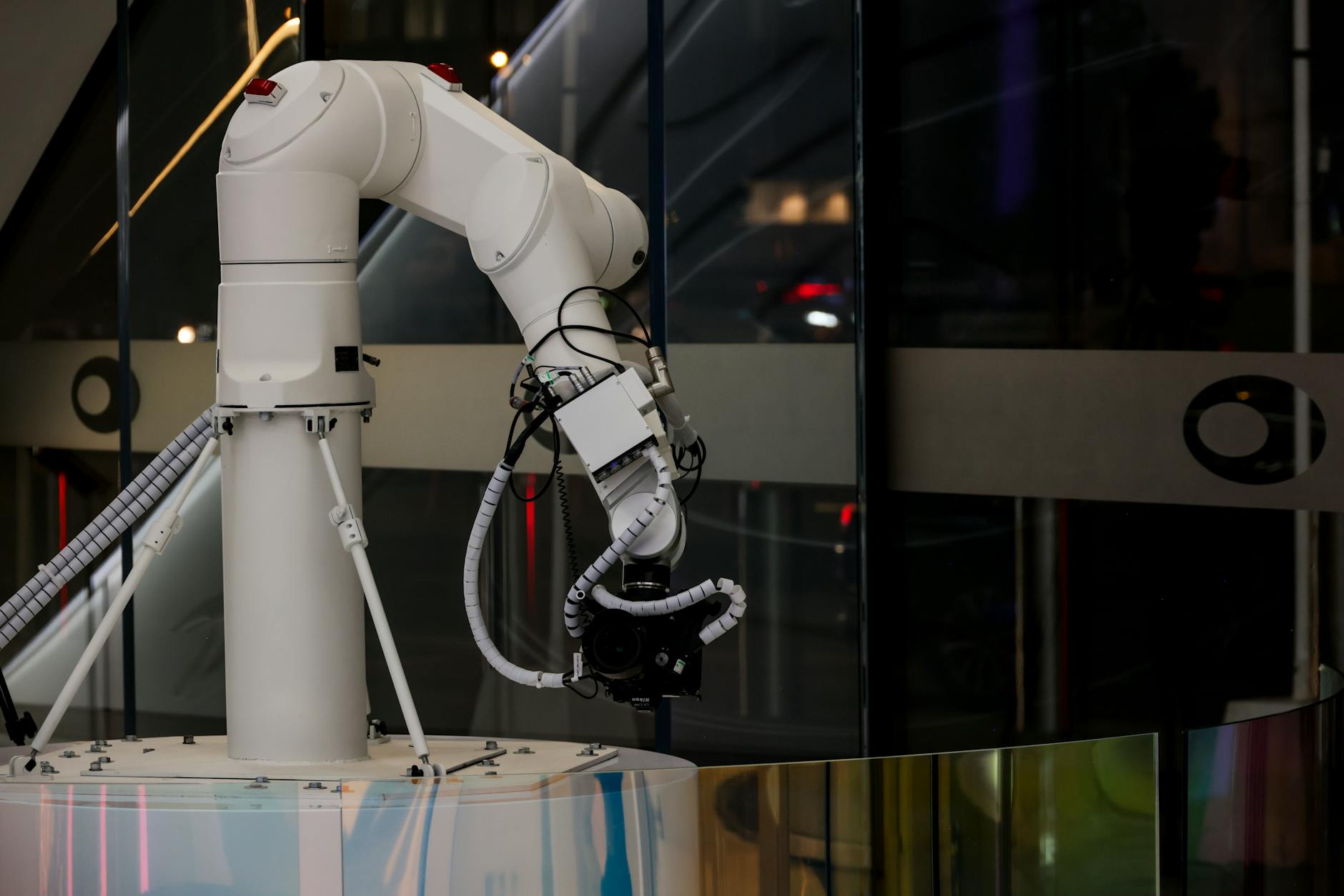 Industrial robot arm performing a task on a factory production line