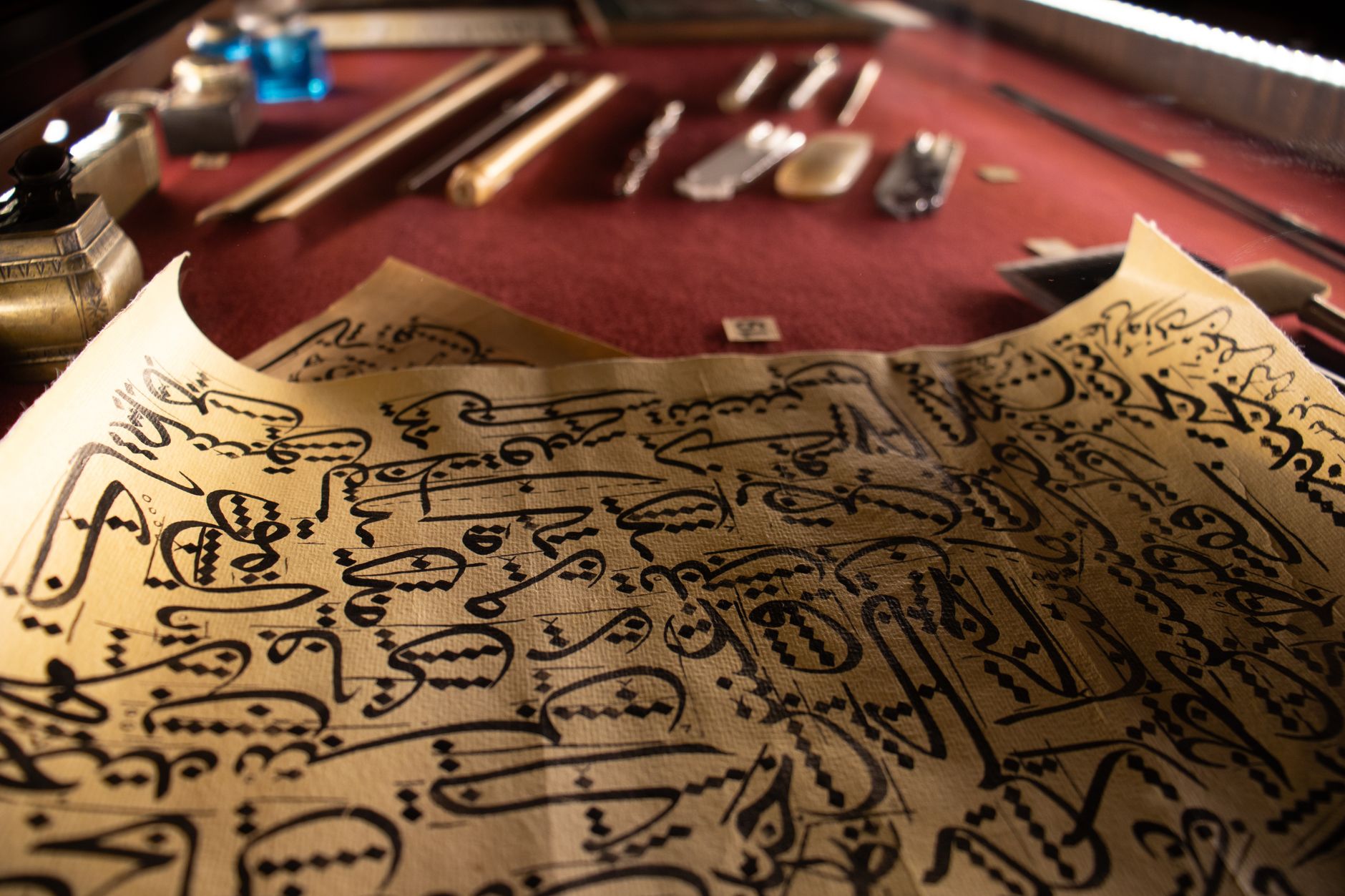 Close-up of handwritten text on aged medieval parchment