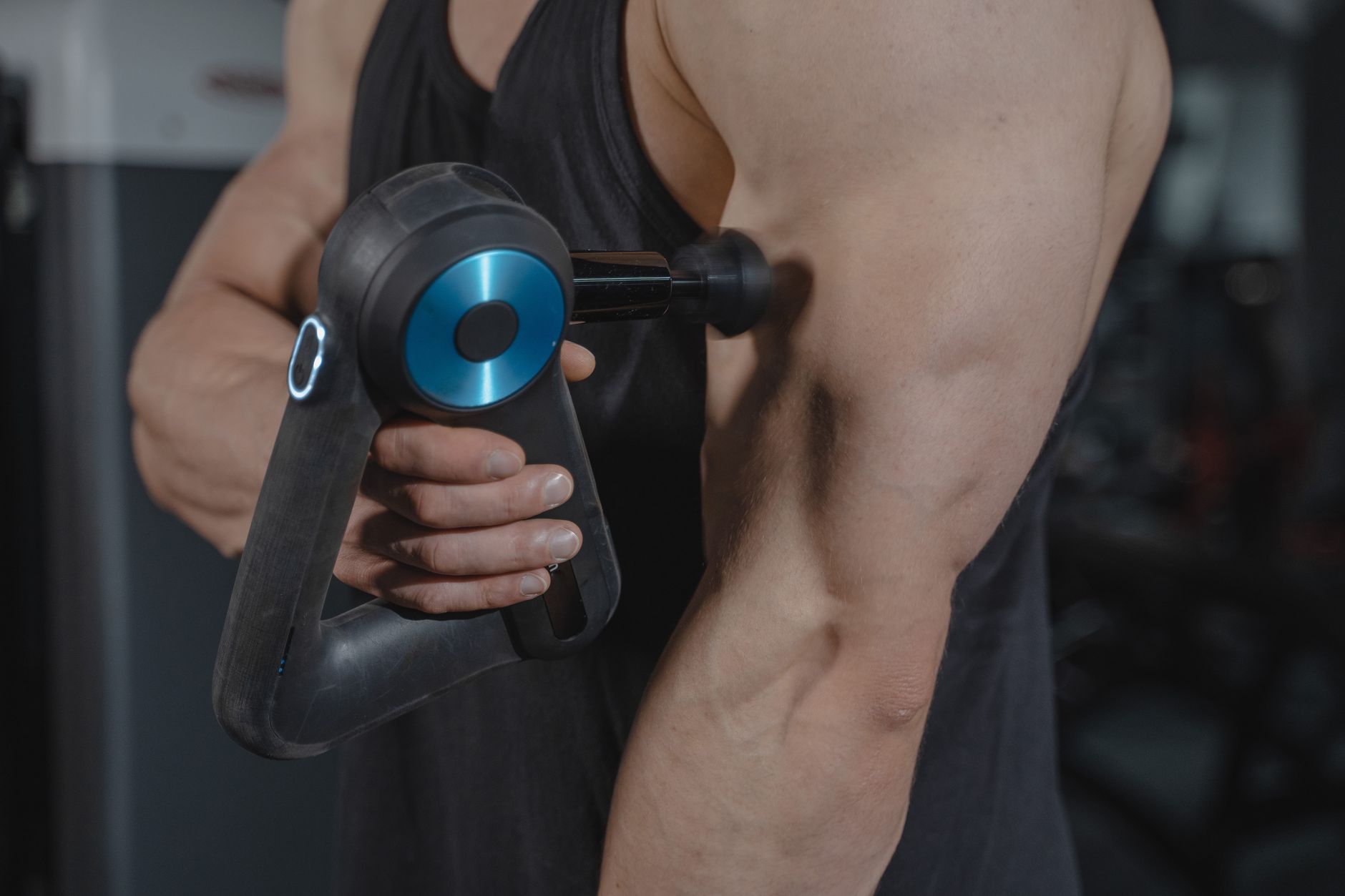 Close-up of hands gripping a barbell during a strength training exercise