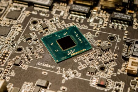 Close-up of a computer motherboard showing UEFI firmware chip components