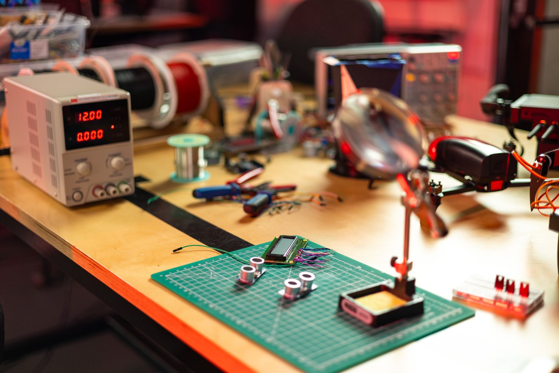 Electronics lab equipment with cables and signal generators used in quantum hardware testing