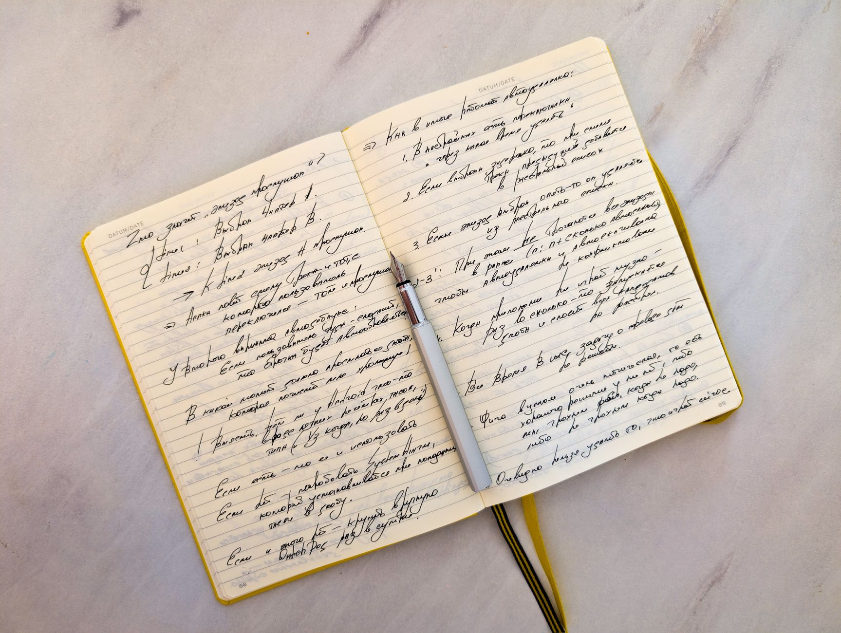 Writer's desk with notebook and pen, representing the act of literary composition