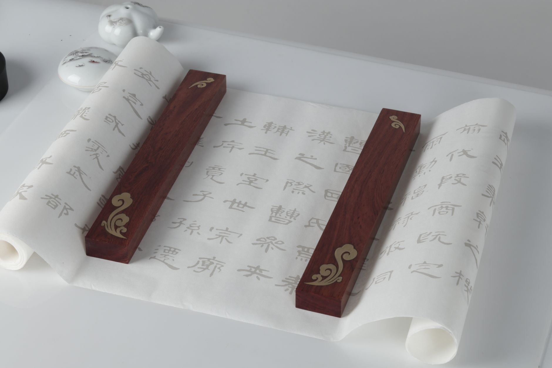 Close-up of a fragmented ancient papyrus scroll under examination