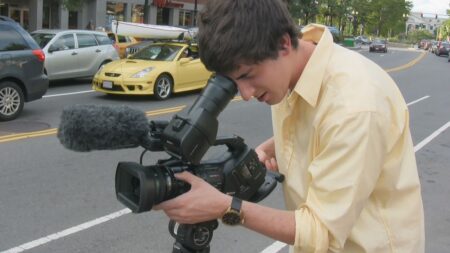 Ross McElwees New Film Turns a Sons Death Into Documentary A handheld documentary film camera resting on a table in dim light