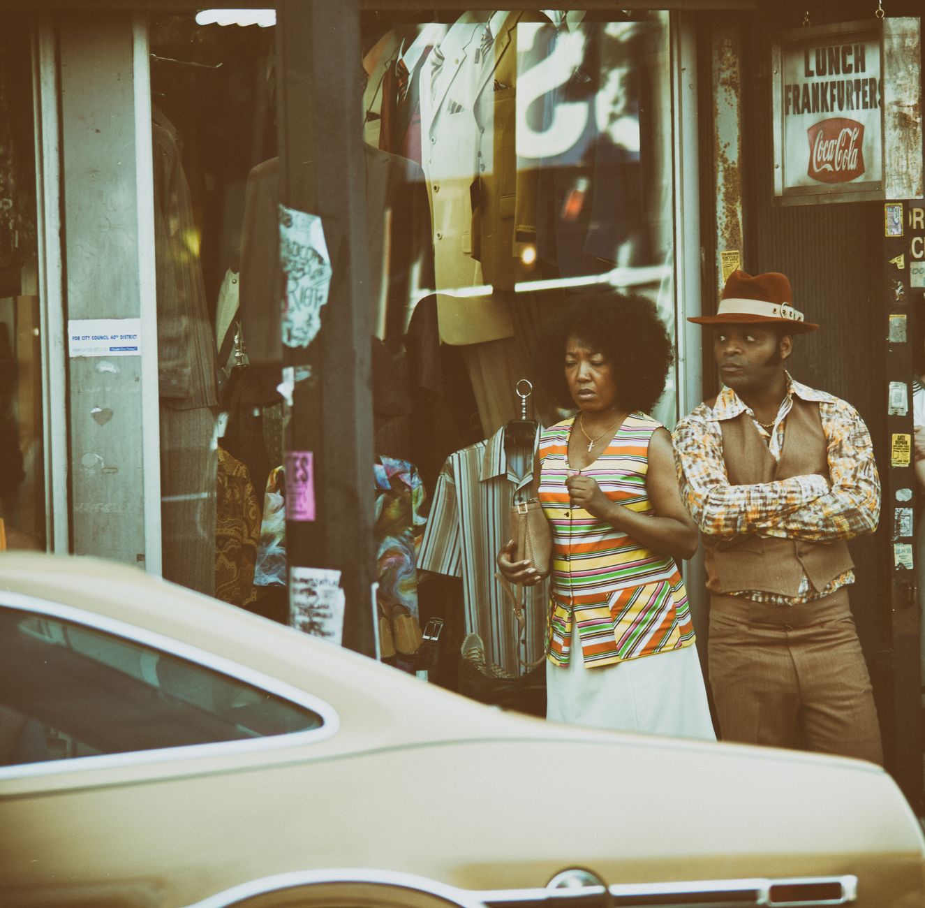 Vintage street scene in Harlem with brownstone buildings and pedestrians