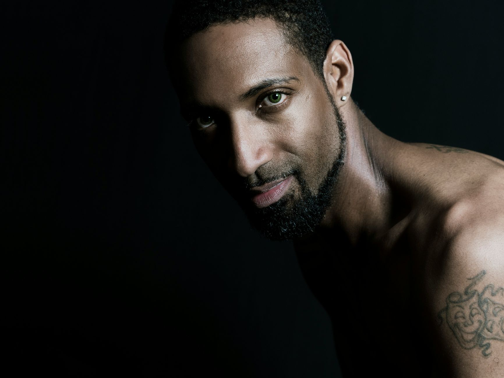 Dramatic portrait of a young male actor in natural light